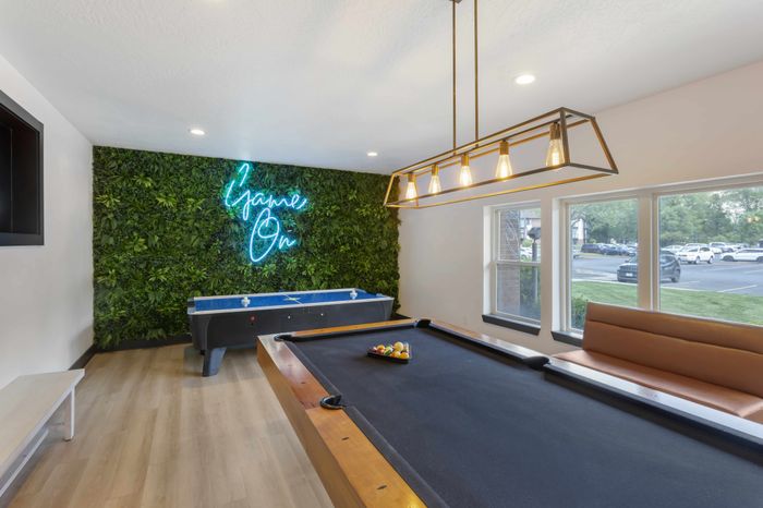 Pool table and air-hockey at The Branbury student apartments in Provo, Utah