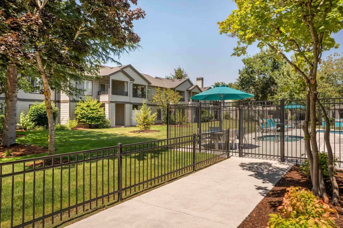 Outdoor Pathway with Pool View at Swimming pool and spa at Forest Hills in Eugene, Oregon