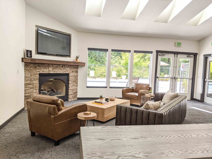 Living Room with Fireplace at Grand Oaks apartment community in Corvallis, Oregon.