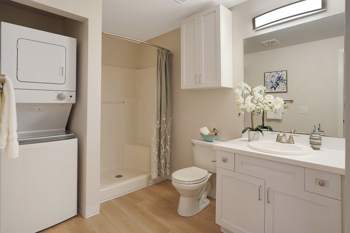 Bathroom with In-Unit Washer/Dryer at Grand Oaks apartment community in Corvallis, Oregon.