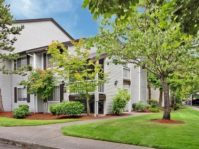 Lush Pacific Northwest landscaping at Greystone Meadows apartments in Federal Way WA