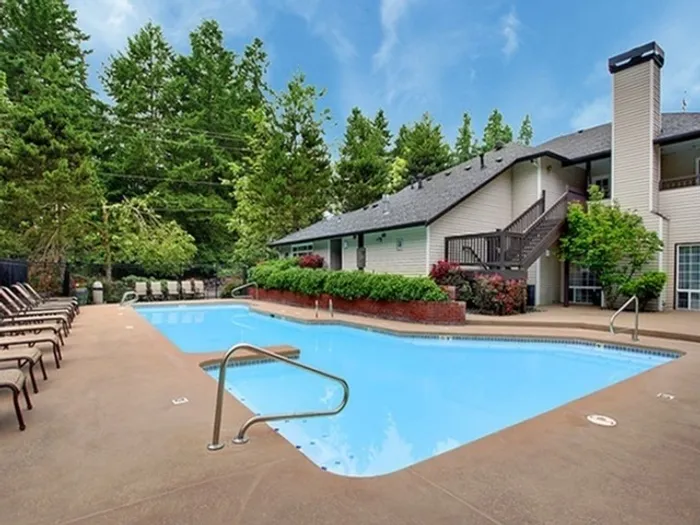 Heated outdoor swimming pool at Greystone Meadows apartment community in Federal Way WA