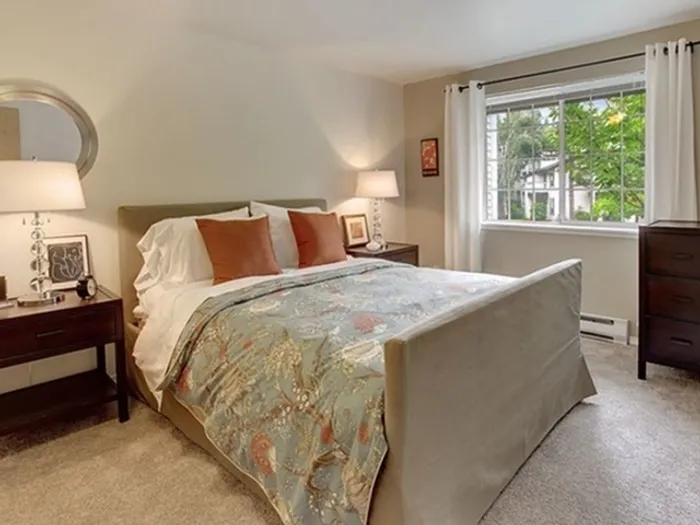 Spacious bedroom with vaulted ceilings in apartment at Greystone Meadows in Federal Way WA