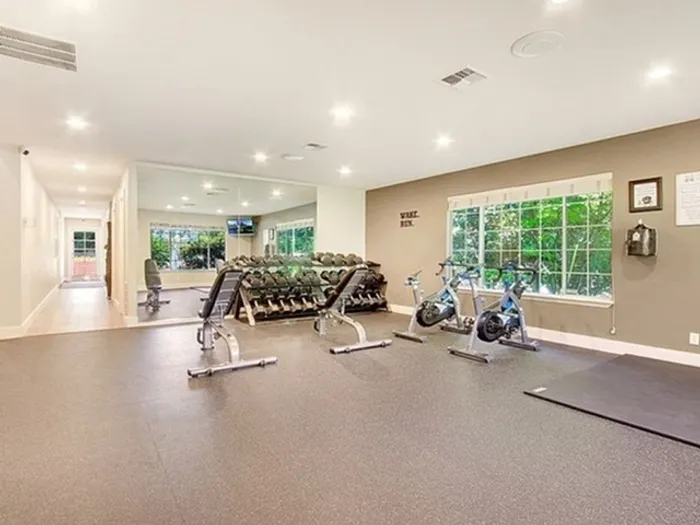 Fully equipped fitness center at Greystone Meadows apartments in Federal Way WA
