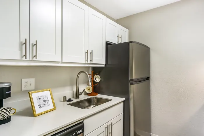 Fully Equipped Kitchen With Modern Appliances at Maplewood Park in Renton, Washington