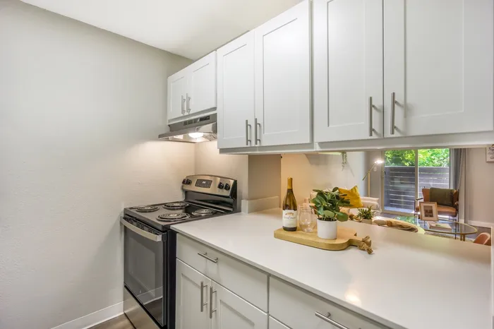 Fully Equipped Kitchen With Modern Appliances at Maplewood Park in Renton, Washington