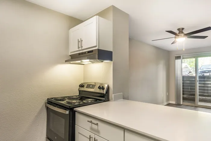 Fully Equipped Kitchen With Modern Appliances at Maplewood Park in Renton, Washington