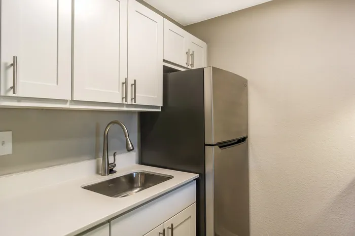 Fully Equipped Kitchen With Modern Appliances at Maplewood Park in Renton, Washington