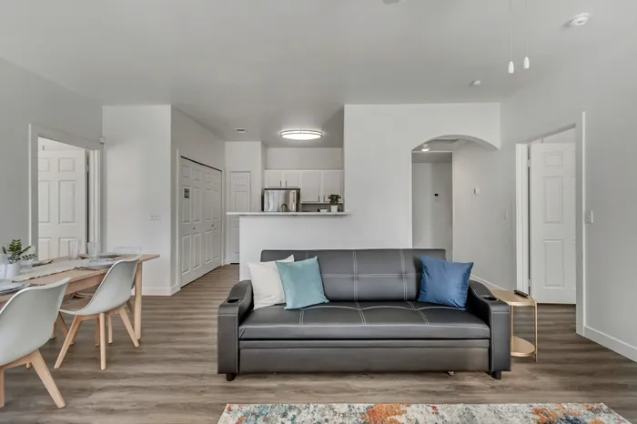Spacious Living Room at Pinnacle Mountain View apartments in Clearfield, UT