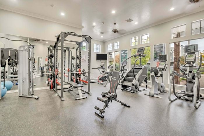 Modern fitness center at Pinnacle Mountain View apartments in Clearfield, UT