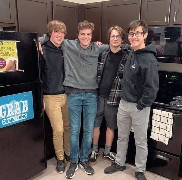 Residents socializing at The Cottages on Lindberg student apartments in West Lafayette, IN