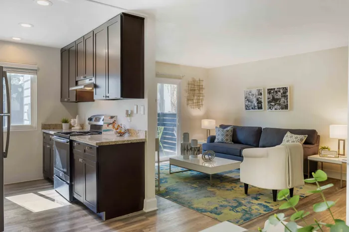 Living Room and Kitchen at the Phoenix Sacramento Apartment Community in Sacramento, California