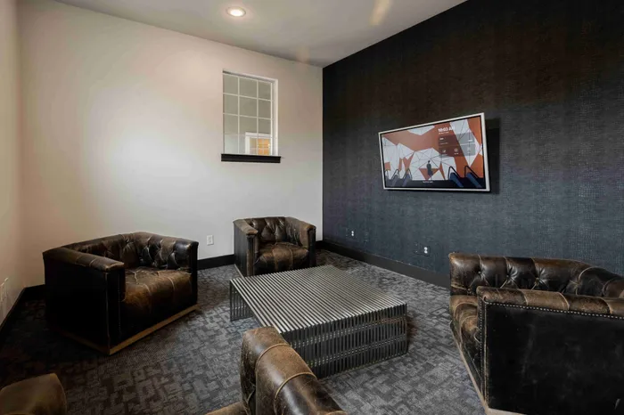 Resident lounge area at The Zone student apartments near Texas A&M University in College Station TX