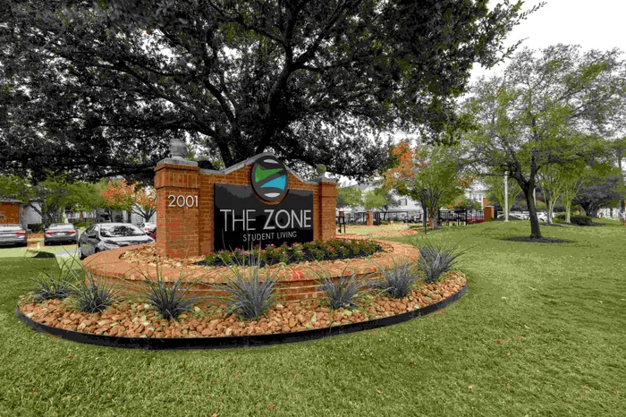 The Zone entrance sign at The Zone student apartments near Texas A&M University in College Station Texas