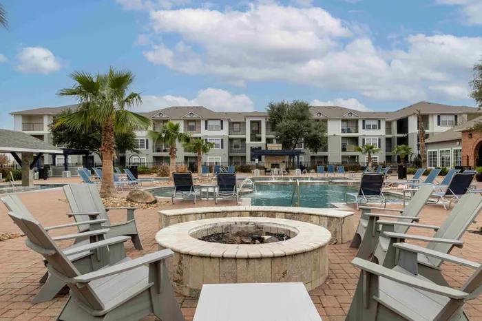 Fire pit and outdoor lounge at The Zone student apartments near TAMU in College Station Texas
