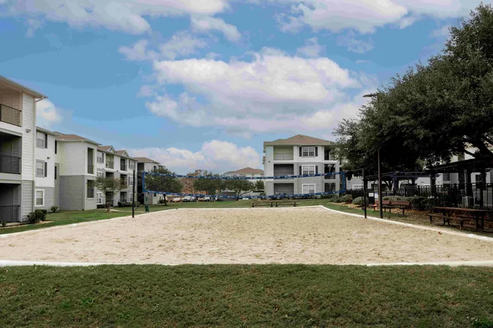 Sand volleyball court at The Zone student apartments near TAMU in College Station Texas