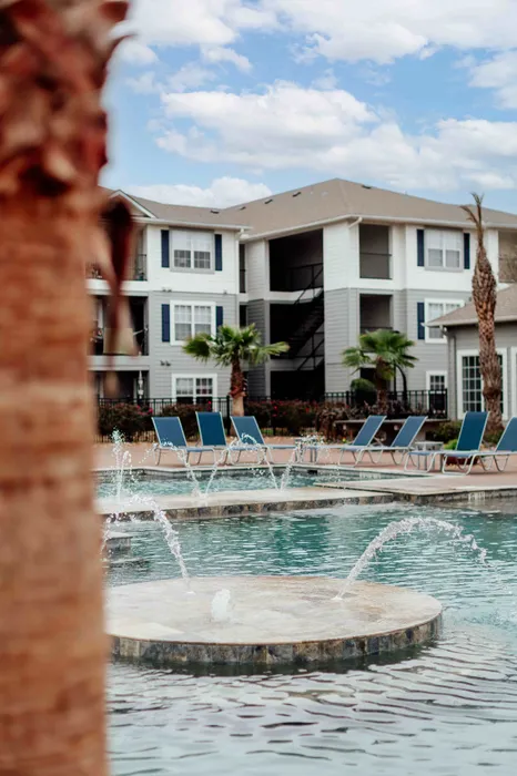 Pool fountain feature at The Zone student apartments near TAMU in College Station Texas