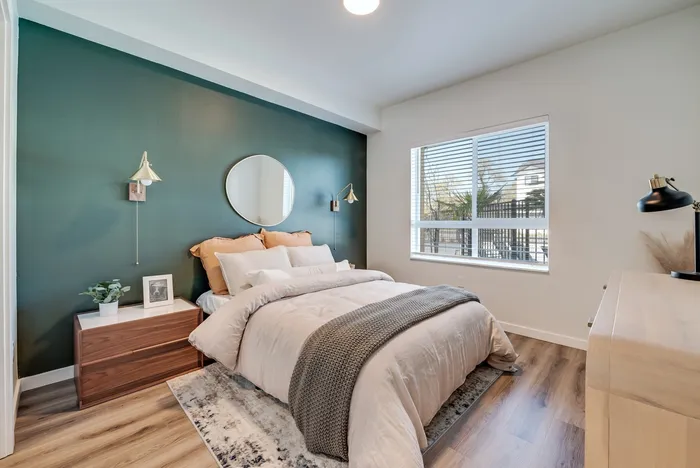 Spacious bedroom with large windows in apartment at The Preserve on Goodpasture Eugene Oregon