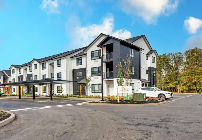 Modern apartment building exterior at The Preserve on Goodpasture riverside community Eugene Oregon