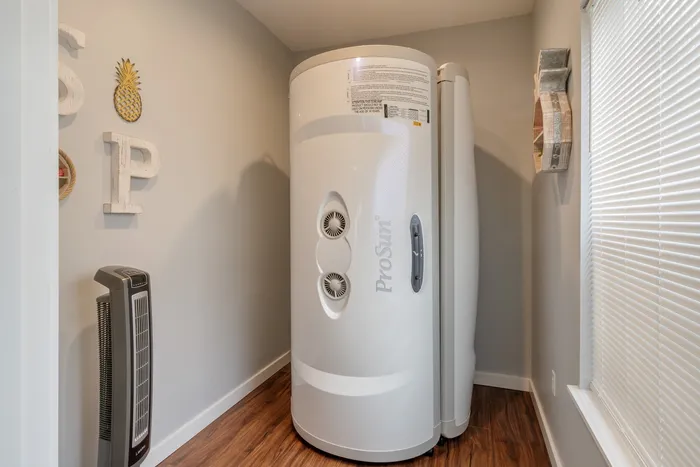 Stand-up tanning bed at Stadium Park Apartment Community in Eugene, Oregon