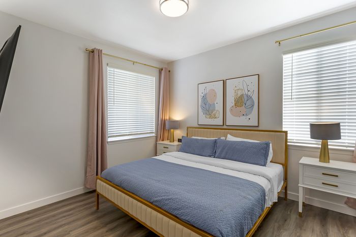 Bedroom at Pinnacle Mountain View apartments in Clearfield, UT
