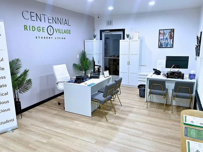 Welcoming office space at Centennial Ridge, Student Living with modern decor and workstations located in Raleigh, NC.