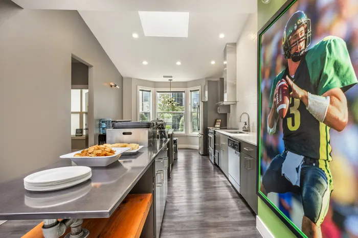 Clubhouse kitchen with modern appliances and open layout at Chase Village apartments in Eugene OR
