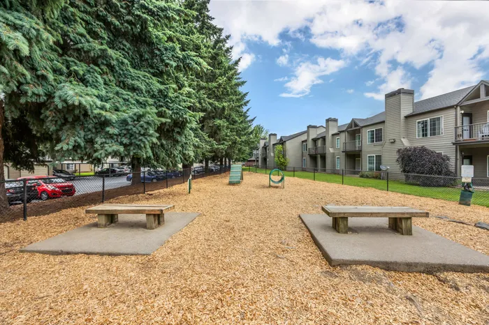 Off-leash dog park in the Gardens area at Chase Village pet-friendly apartments in Eugene OR