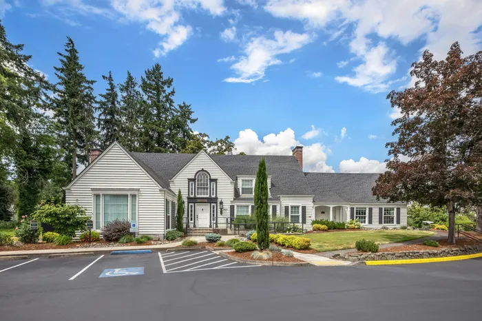 Mansion section building exterior with lush landscaping at Chase Village Eugene OR