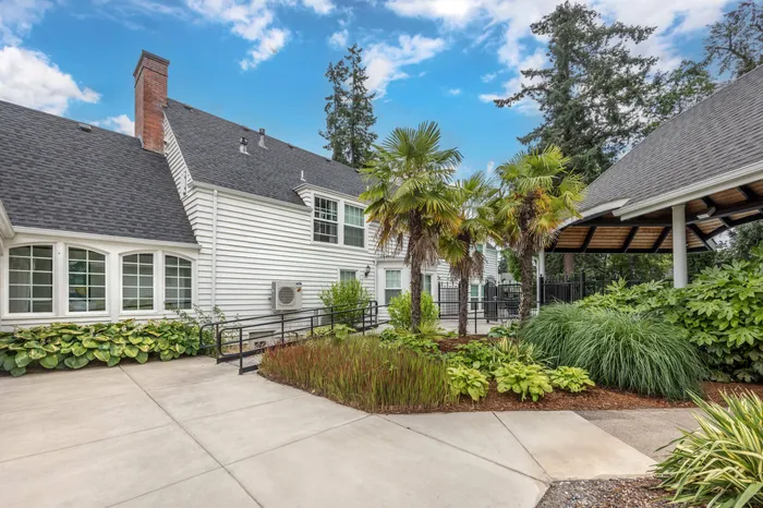 Second view of Mansion building exterior at Chase Village apartment community in Eugene OR