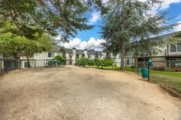Off-leash dog park in the Village area at Chase Village pet-friendly apartments Eugene OR