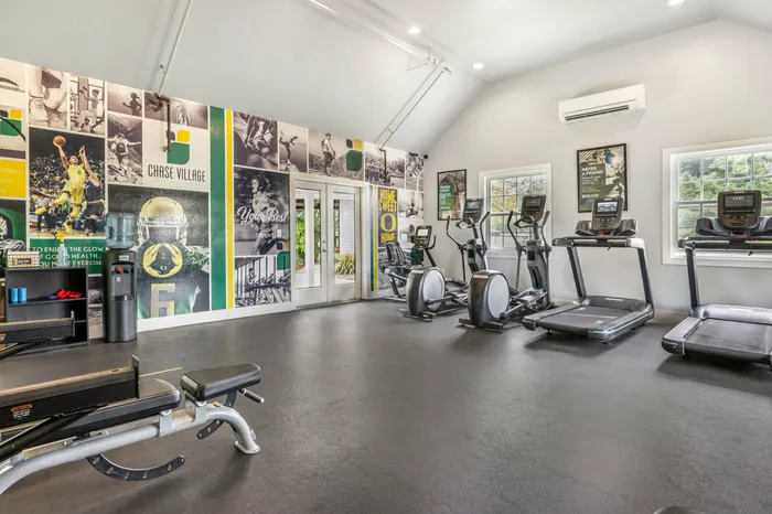 Second view of Village fitness center with weight and cardio equipment at Chase Village Eugene OR