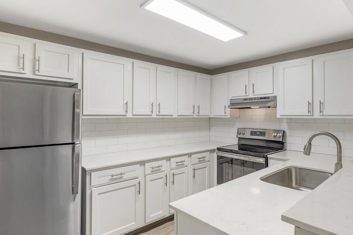 Model Kitchen at The Colony at Bear Creek Apartment Community in Redmond, Washington
