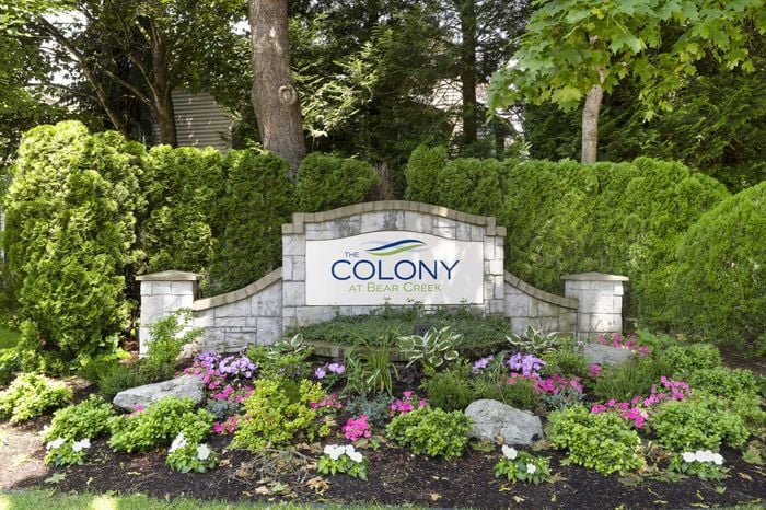 Monument Sign at The Colony at Bear Creek Apartment Community in Redmond, Washington