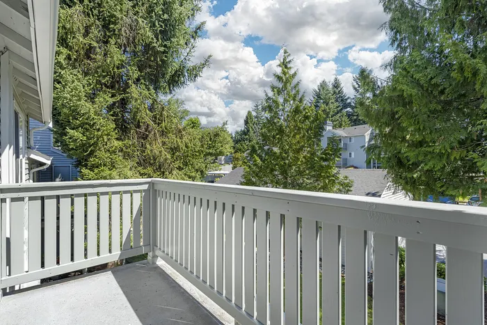 Canyon Springs private apartment balcony with scenic views of lush Pacific Northwest trees in Lynnwood Washington