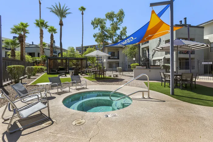255 North luxury hot tub spa surrounded by lush landscaping at Tucson AZ apartment community