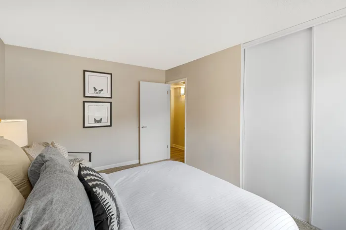 The Phoenix Reno inviting bedroom with cozy textiles, modern decor, and ample natural light in Reno NV