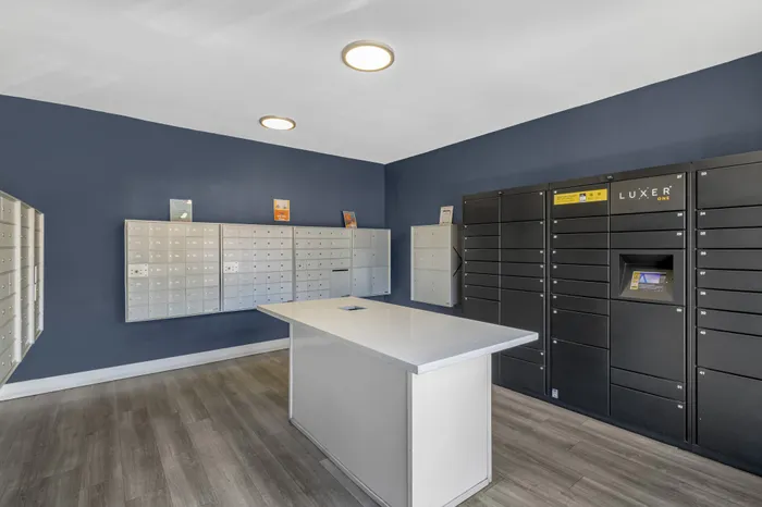 The Phoenix Reno mail room with secure Luxer One package lockers and individual mailboxes in Reno NV
