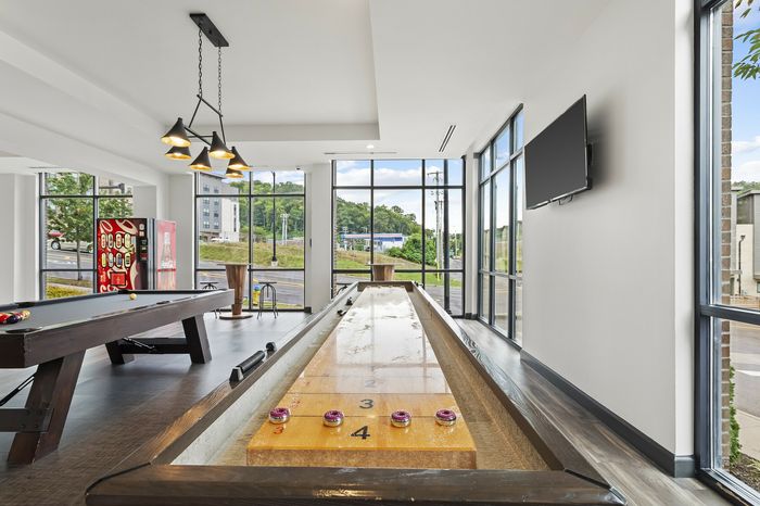 303 Flats game lounge featuring billiards and entertainment amenities for students in Knoxville Tennessee