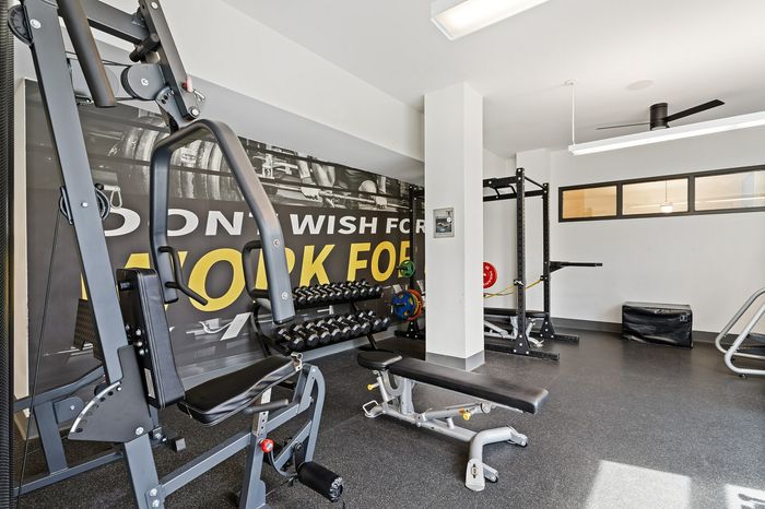 303 Flats fully equipped gym with Peloton bikes and strength training machines in Knoxville Tennessee