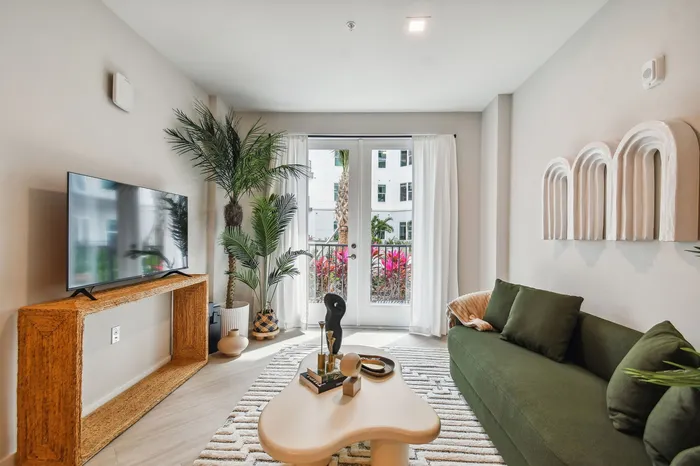Bright open living room with contemporary design at Niche luxury apartments in Tampa, FL