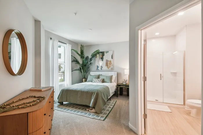 Elegant bedroom interior at Niche luxury apartments in Tampa, FL