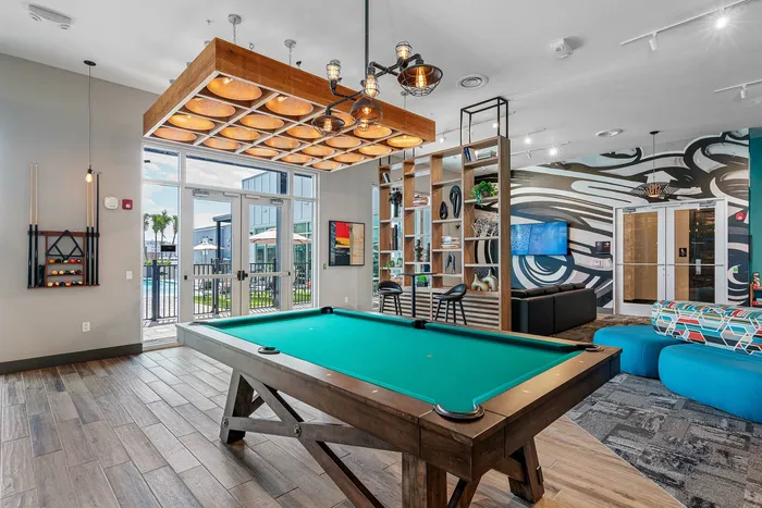Upscale resident lounge with comfortable seating at Niche luxury apartments in Tampa, FL