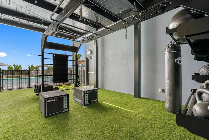 Well-equipped gym with premium fitness machines at Niche luxury apartments in Tampa, FL
