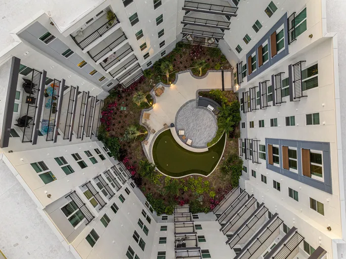 Bird's eye view of Niche luxury apartments and surrounding neighborhood in Tampa, FL