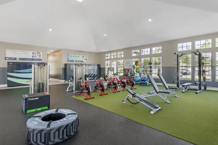 The Phoenix Orlando fitness studio and gym with cycling machines and free weights.