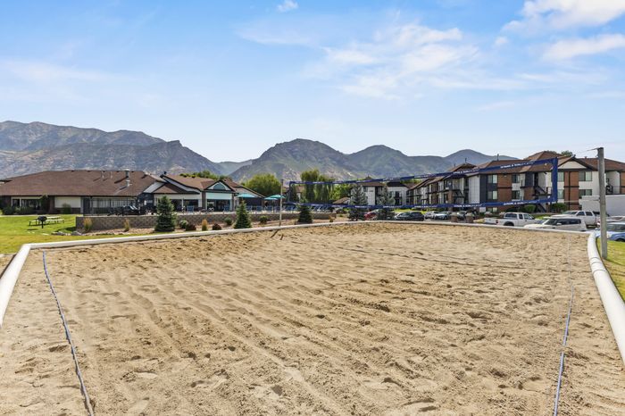 Sand volleyball court with mountain views at The Branbury student apartments in Provo, UT near Brigham Young University