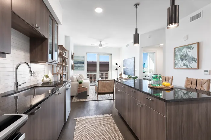 Chef-inspired kitchens featuring expansive islands and wine fridges with wine racks*