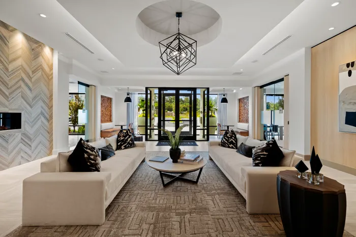 Image of resident lobby with cozy fireplace and ample seating ideal for remote working