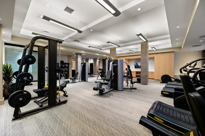 fitness center with cardio and strength machines